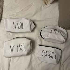 Set of White Cosmetic Bags with Black Text